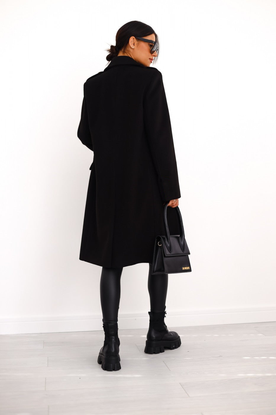 Manteau femme long à boutons coupe élégante en maille mélangée usage urbain